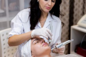 young-beautiful-girl-lies-beautician-s-table-receives-procedures_343596-4239